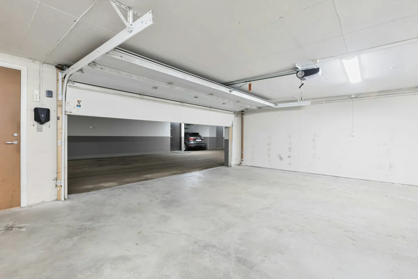 Open residential garage used as contextual maintenance imagery